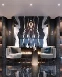 The gradient on the coffee table emphasizes the combination of light and dark tones in the interior The gradient on the coffee table emphasizes the combination of light and dark tones in the interior