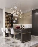 A striking kitchen and bar area A striking kitchen and bar area