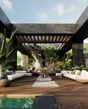 Lounge area with a fire pit under the pergola Lounge area with a fire pit under the pergola